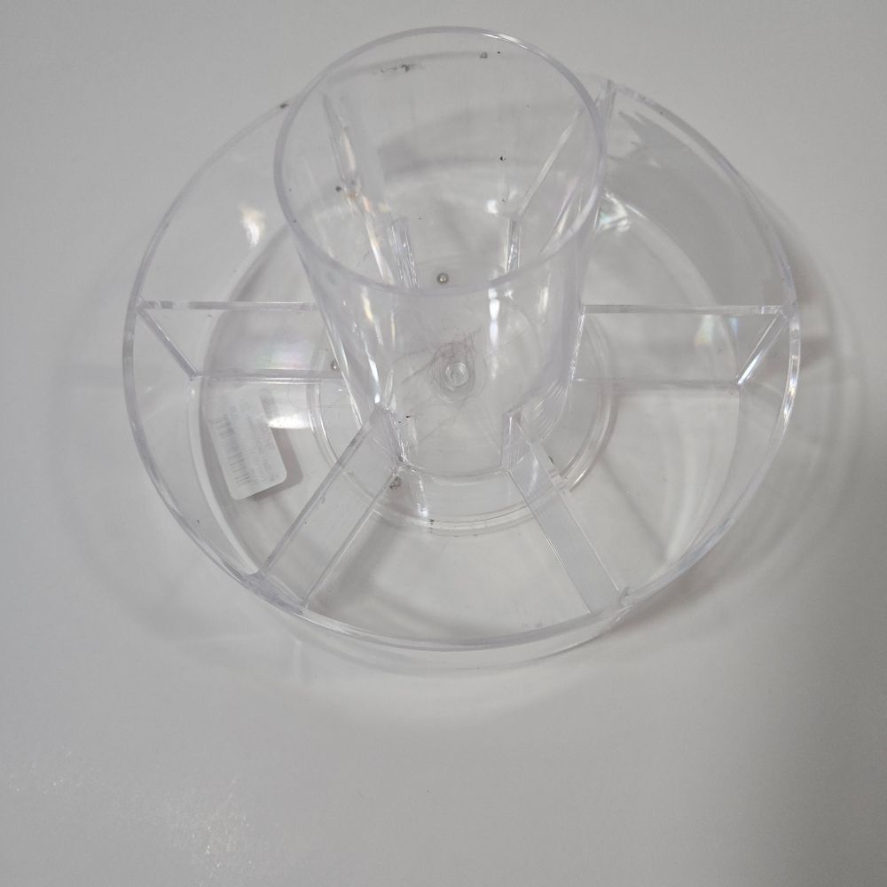 Circle, moveable makeup holder